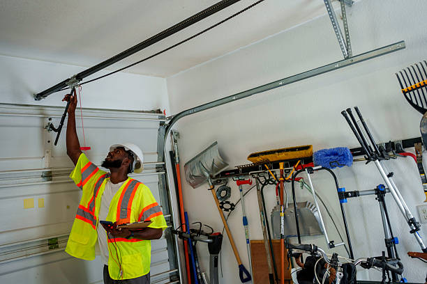Professional Garage Door Roller Replacement technician working in Monroeville, OH